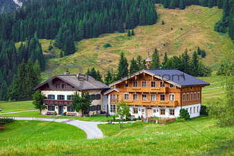 Beautiful typical mountain guests houses on austrian alps 
