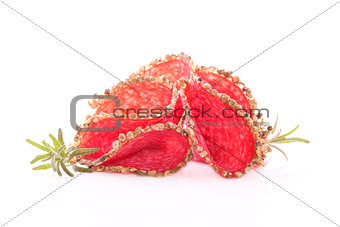 Salami slices isolated over white.