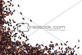 Black rice background with copy space.