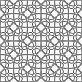 White geometrical ornament perforated with gray