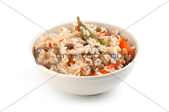 A plate of rice with vegetables