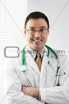 Friendly male doctor smiling