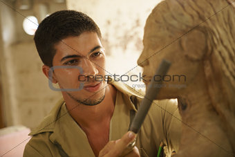 Sculptor young artist artisan working sculpting sculpture