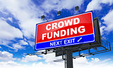 Crowd Funding Inscription on Red Billboard.