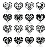Folk hearts with flowers and birds icons set