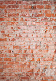 Vertical red brick wall texture