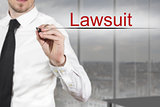 businessman writing in the air lawsuit
