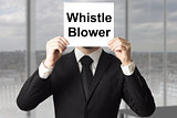 businessman hiding face behind sign whistle blower