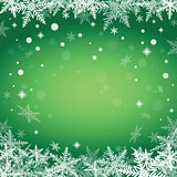 Christmas snowflakes on green background.