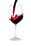 Glass of red wine closeup isolated on white