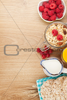 Healthy breakfast with muesli, berries and milk