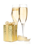 Champagne glasses with golden ribbon