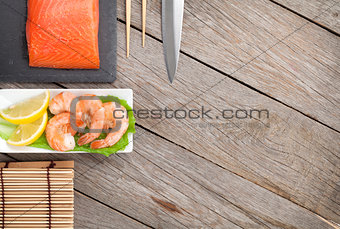 Fresh sea food and kitchen utensils