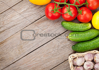 Fresh ripe vegetables on wooden table