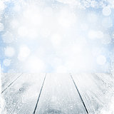 Christmas winter background with snow and wooden table