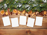 Christmas background with photo frames, snow fir tree, spices an