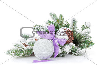 Christmas bauble with purple ribbon and fir tree
