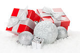 Christmas baubles and red gift boxes