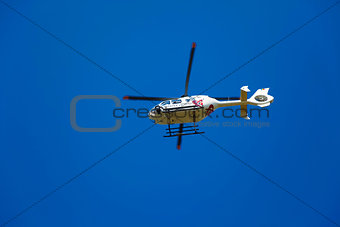 TV news helicopter on a blue sky