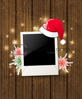Christmas background with photo and Santa's hat