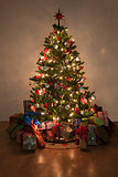 illuminated christmas tree with presents
