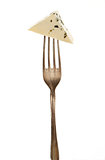 Cheese piece on fork.