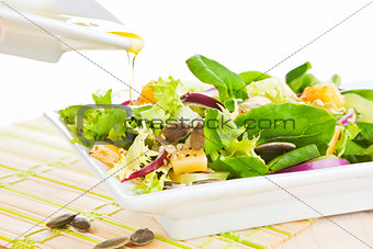 Salad with olive oil.