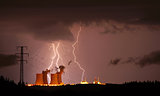 Lightning storm over a nuclear power plant.