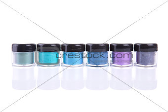 Mineral eye shadows in clear plastic jars 