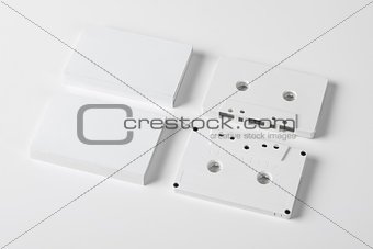 Two blank audio cassettes