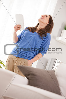 successful woman with her tablet