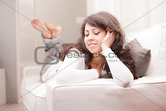 young woman relaxing and thinking