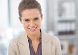 Portrait of smiling business woman in modern office