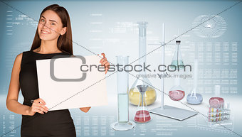 Businesswoman hold paper sheet. Flasks chemistry lab