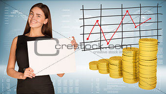 Business woman hold empty paper. Stacks of gold coins