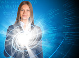 Businesswoman pointing her finger on glowing spiral