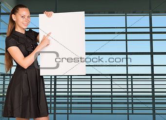 Businesswoman holding empty paper