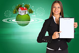 Beautiful businesswoman holding paper holder. Earth with house and trees