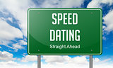 Speed Dating on Green Highway Signpost.