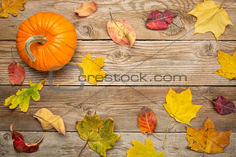 weathered wood background with leaves