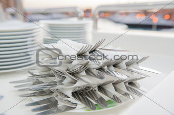 Stack of wrapped cutlery
