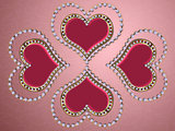 Four hearts of pearls