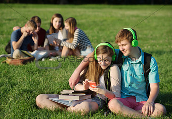 Friends Listening to MP3 Player