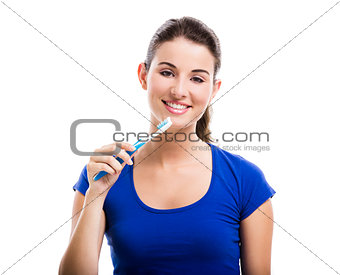 Beautiful woman with a toothbrush