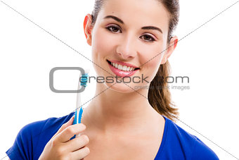 Beautiful woman with a toothbrush