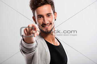 Young man pointing