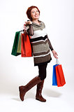 attractive woman holding shopping bags