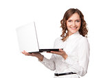 Portrait of a pretty young businesswoman holding a laptop