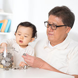 Asian family saving money
