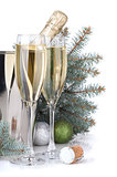 Champagne, blue firtree and christmas decor